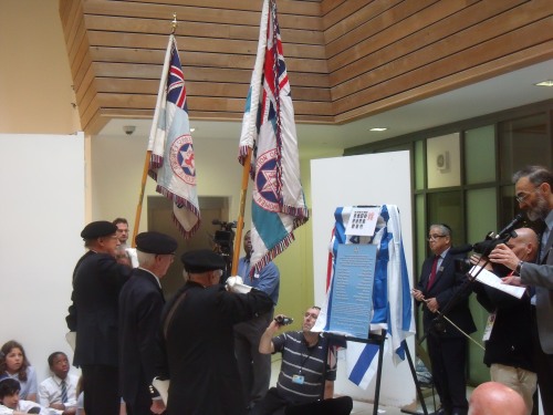 Jewish war veterans present a wreath.