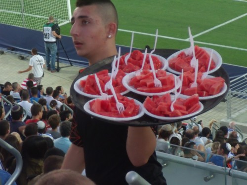 Water melon being served up at the game.